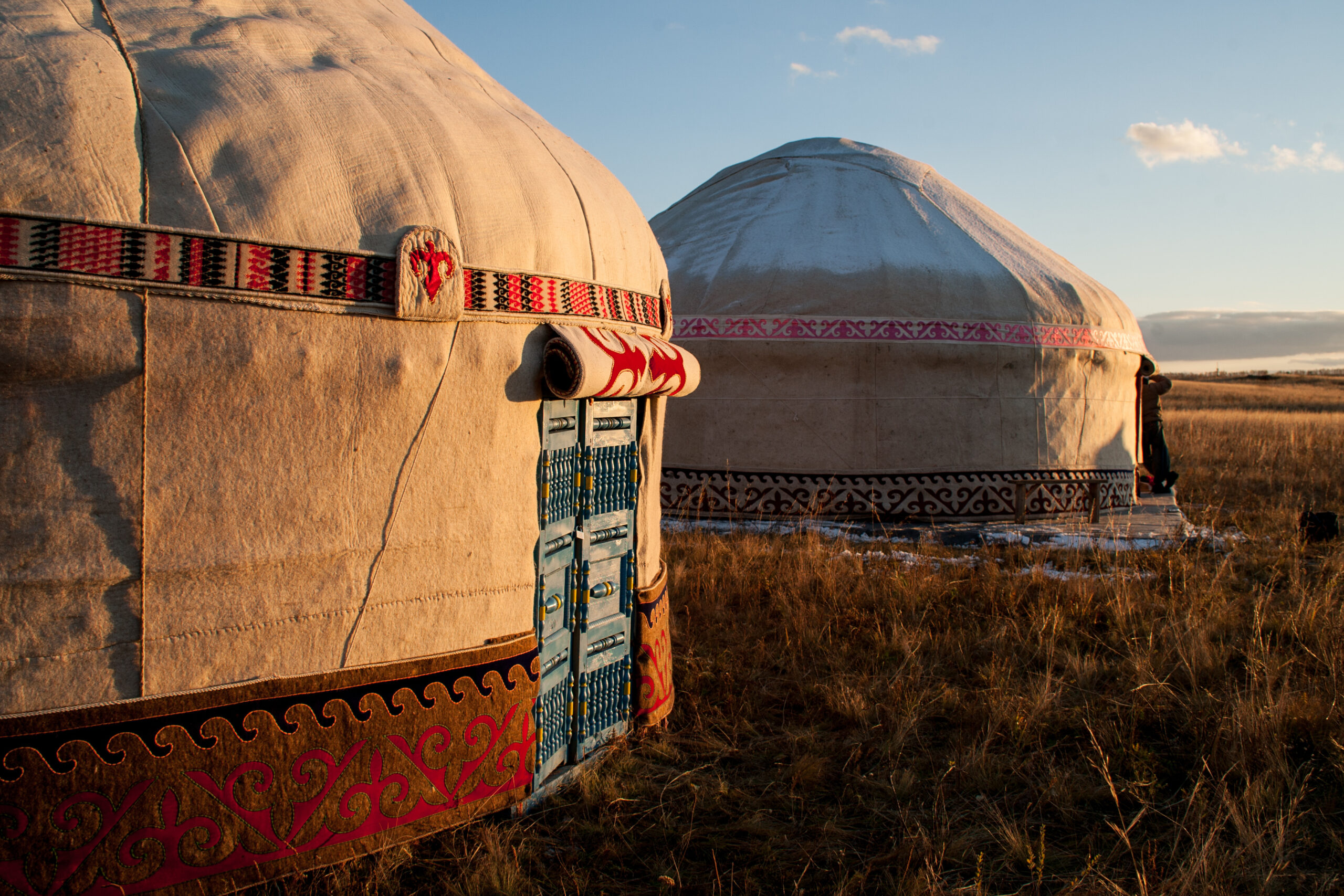 Kazakh yourt in evening steppe.